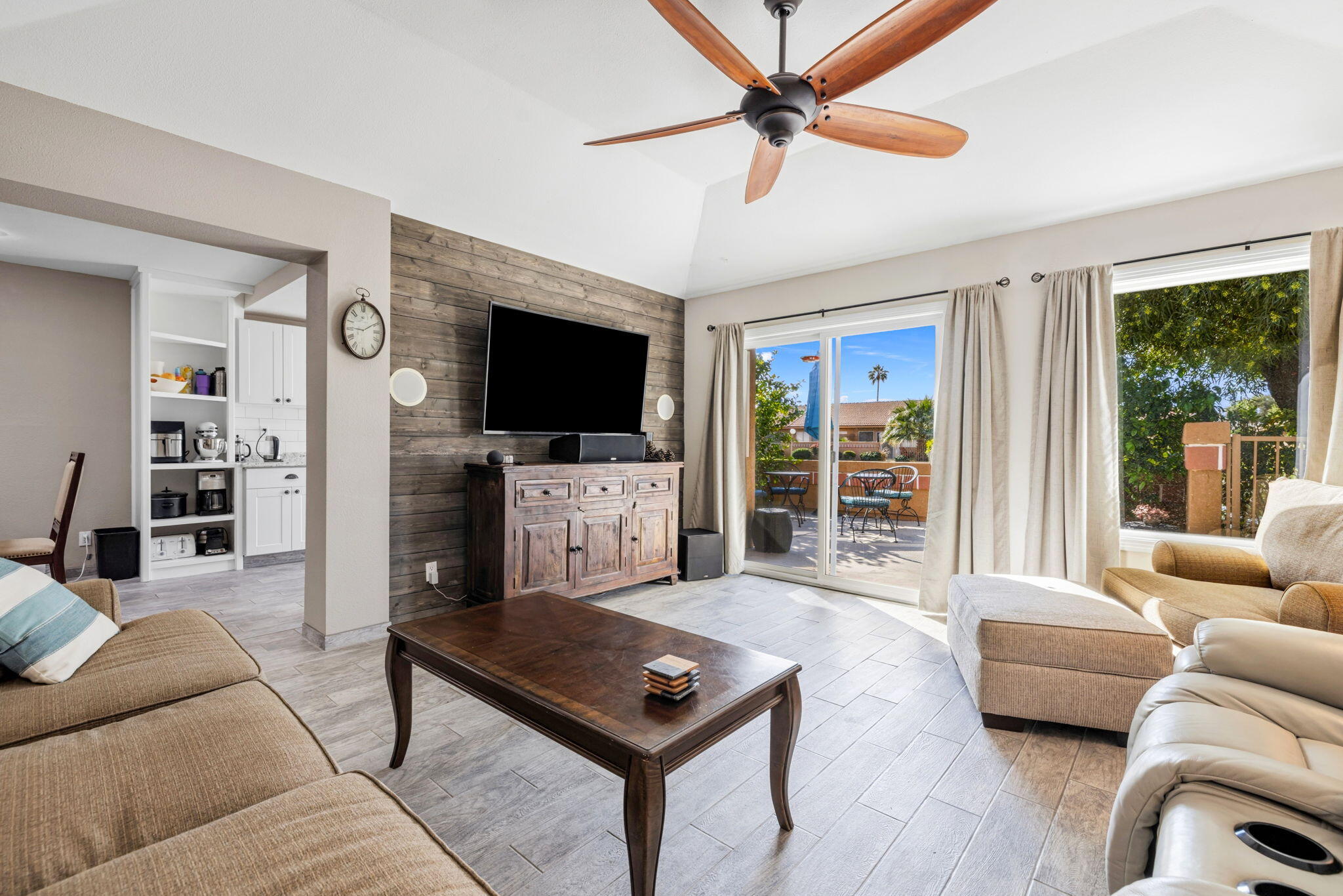 82191 Ullman Road Indio, CA 92201 - Photo 12 of 40 a living room with furniture and a flat screen tv
