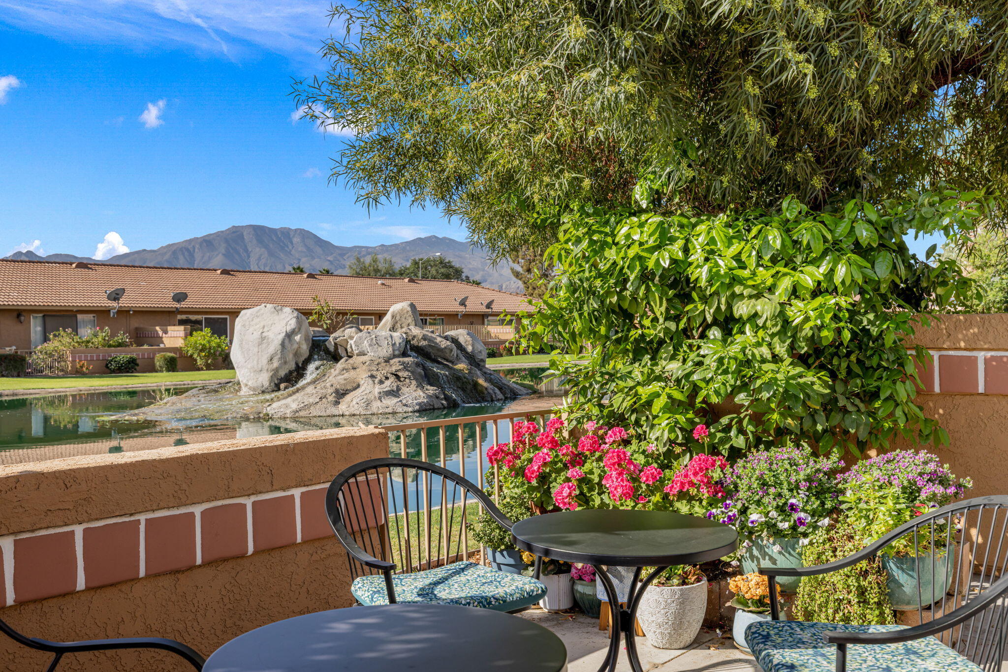 82191 Ullman Road Indio, CA 92201 - Photo 3 of 40 a view of a chairs and table in the terrace