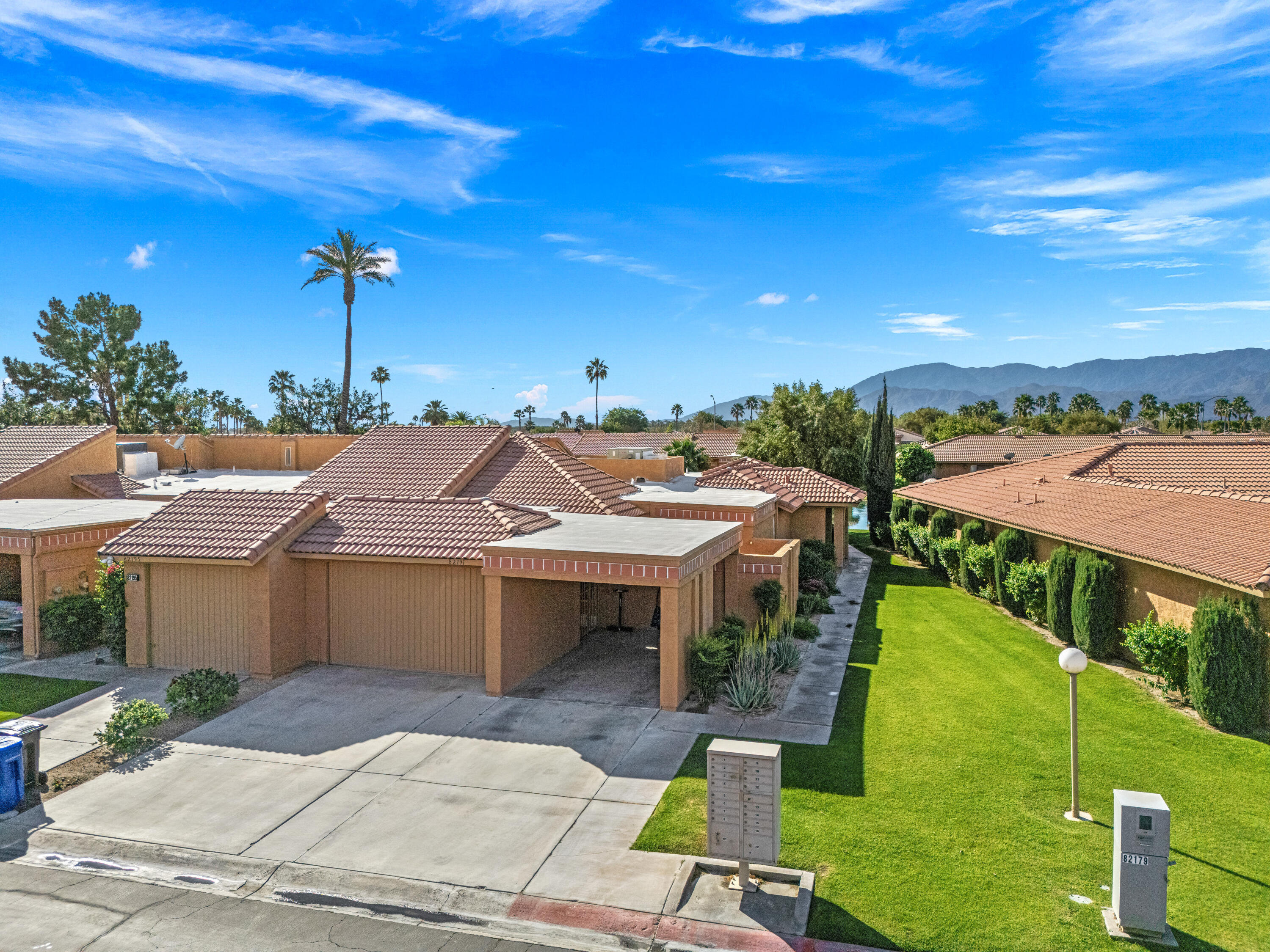 82191 Ullman Road Indio, CA 92201 - Photo 9 of 40 a front view of house with a garden