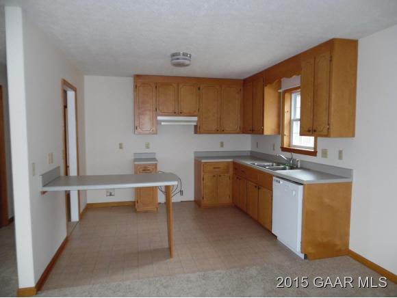 66 Overlook Road Monterey, VA 24465 - Photo 3 of 10 a kitchen with a sink cabinets and window