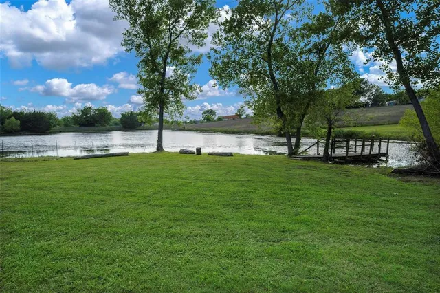 a view of pool with outdoor