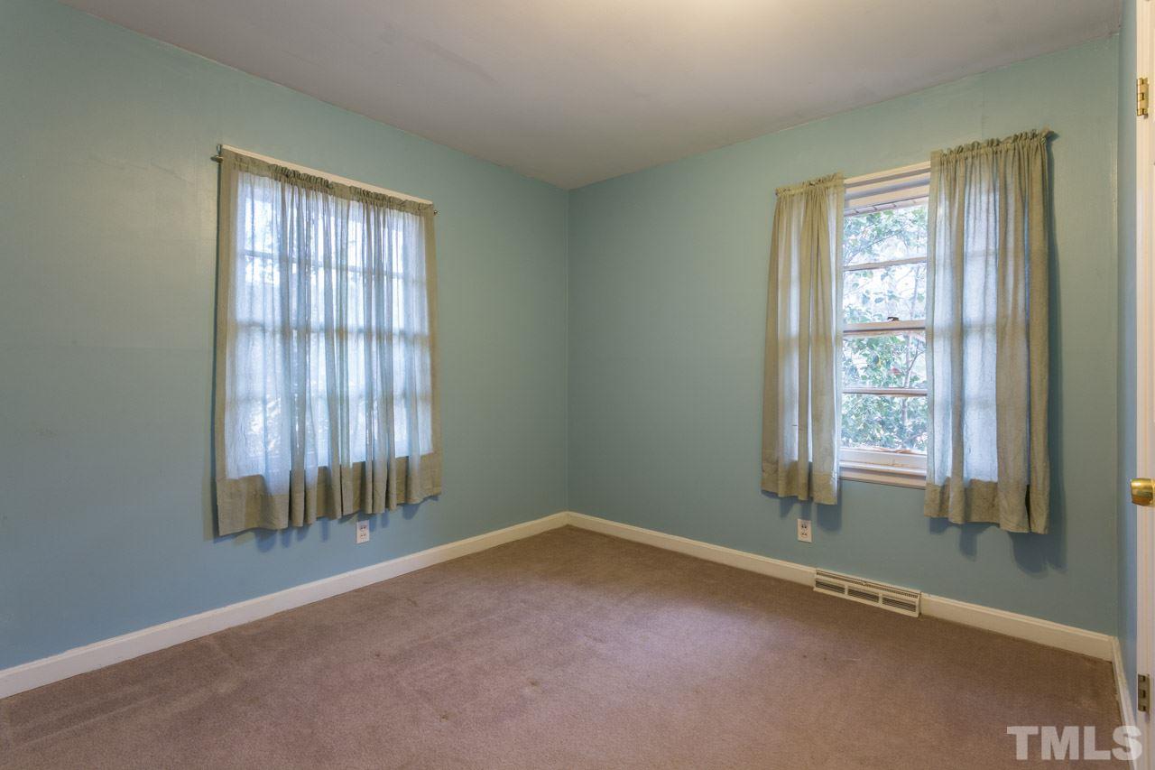 325 Hocutt Road Durham, NC 27703 - Photo 16 of 22 an empty room with a window