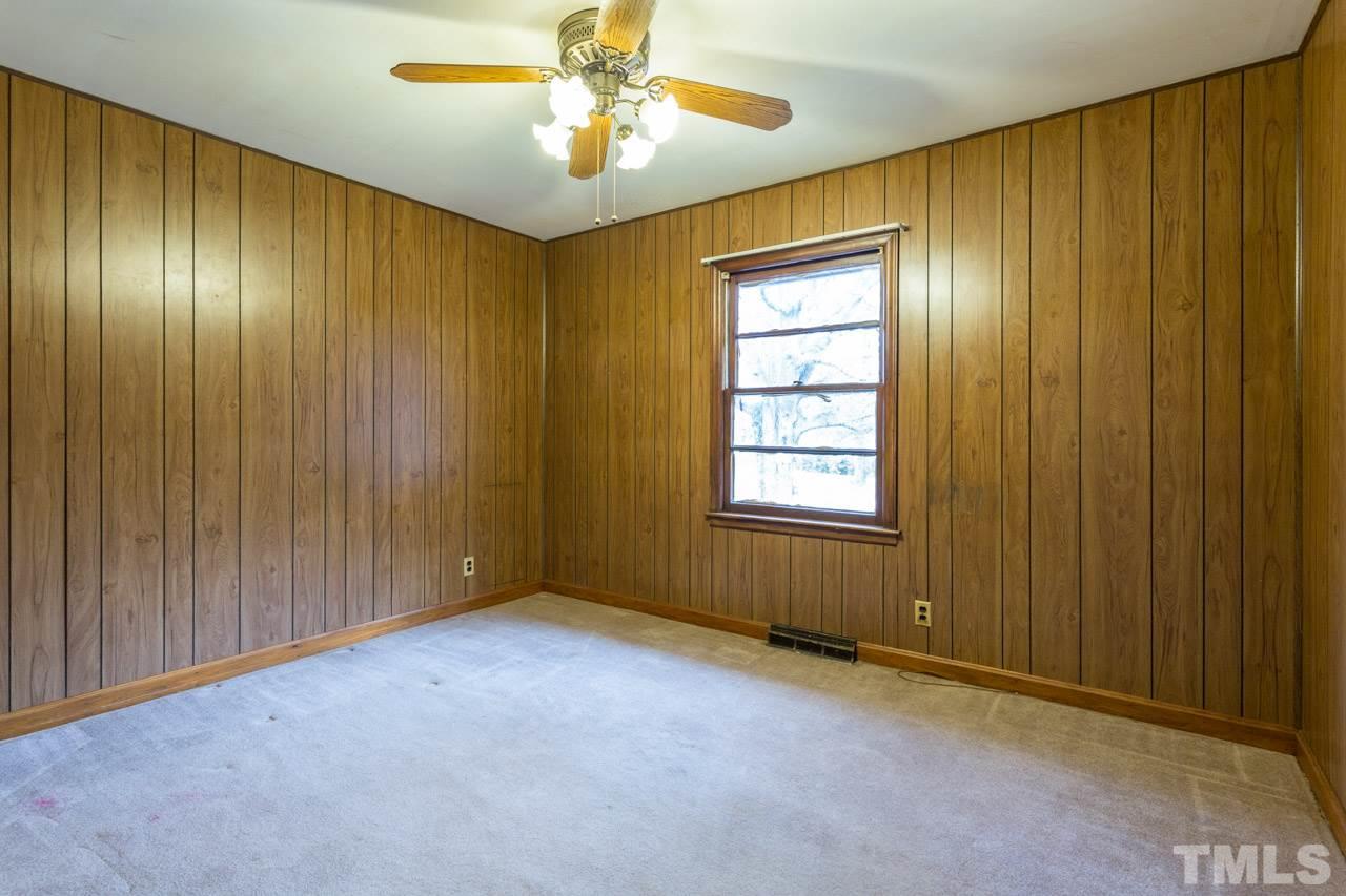 325 Hocutt Road Durham, NC 27703 - Photo 18 of 22 a view of an empty room with a window