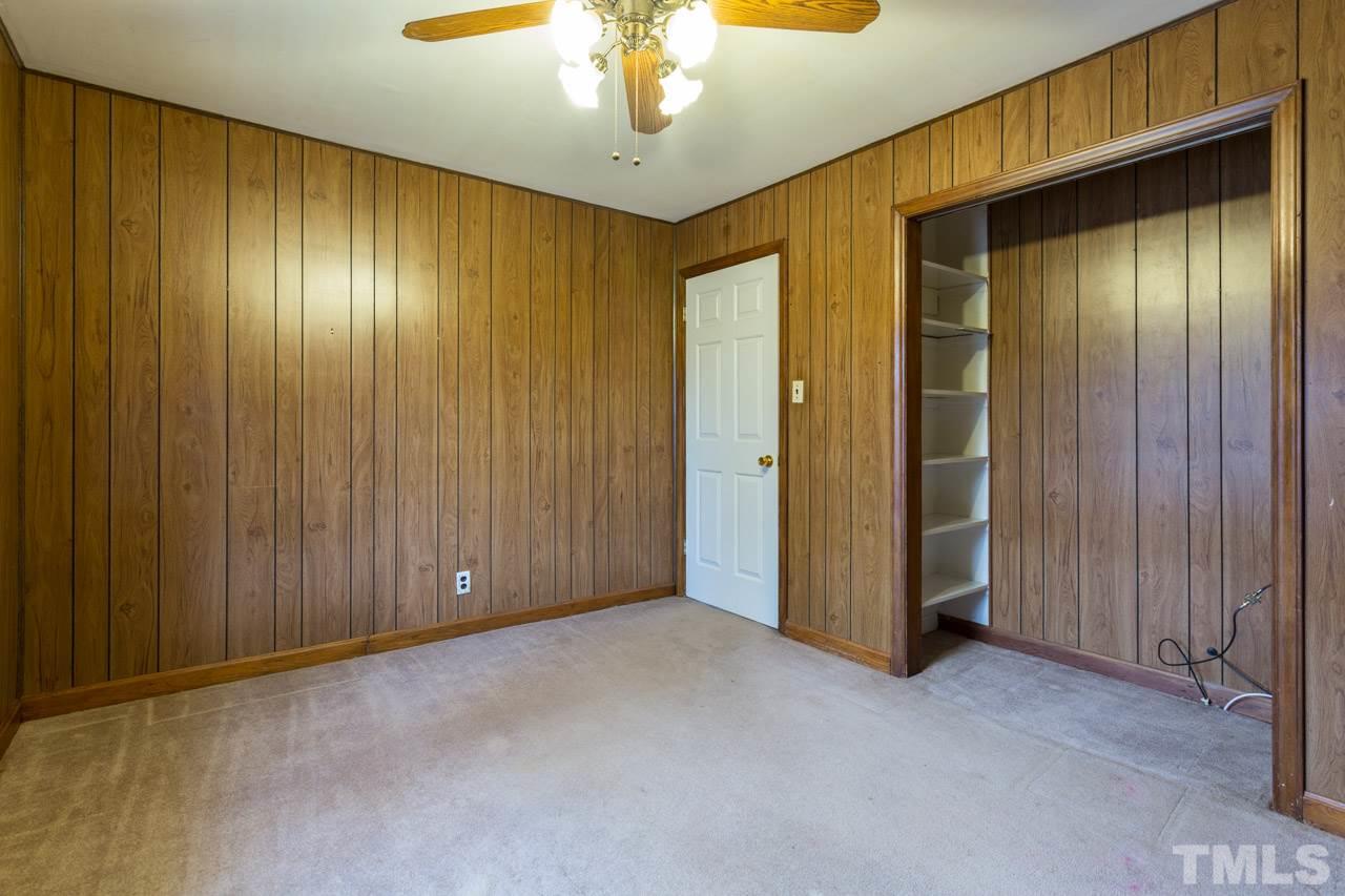 325 Hocutt Road Durham, NC 27703 - Photo 19 of 22 a view of an empty room with a window