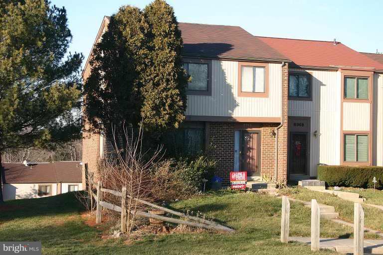 8966 Centerway Road Gaithersburg, MD 20879 - Photo 1 of 1 front view of house with a yard