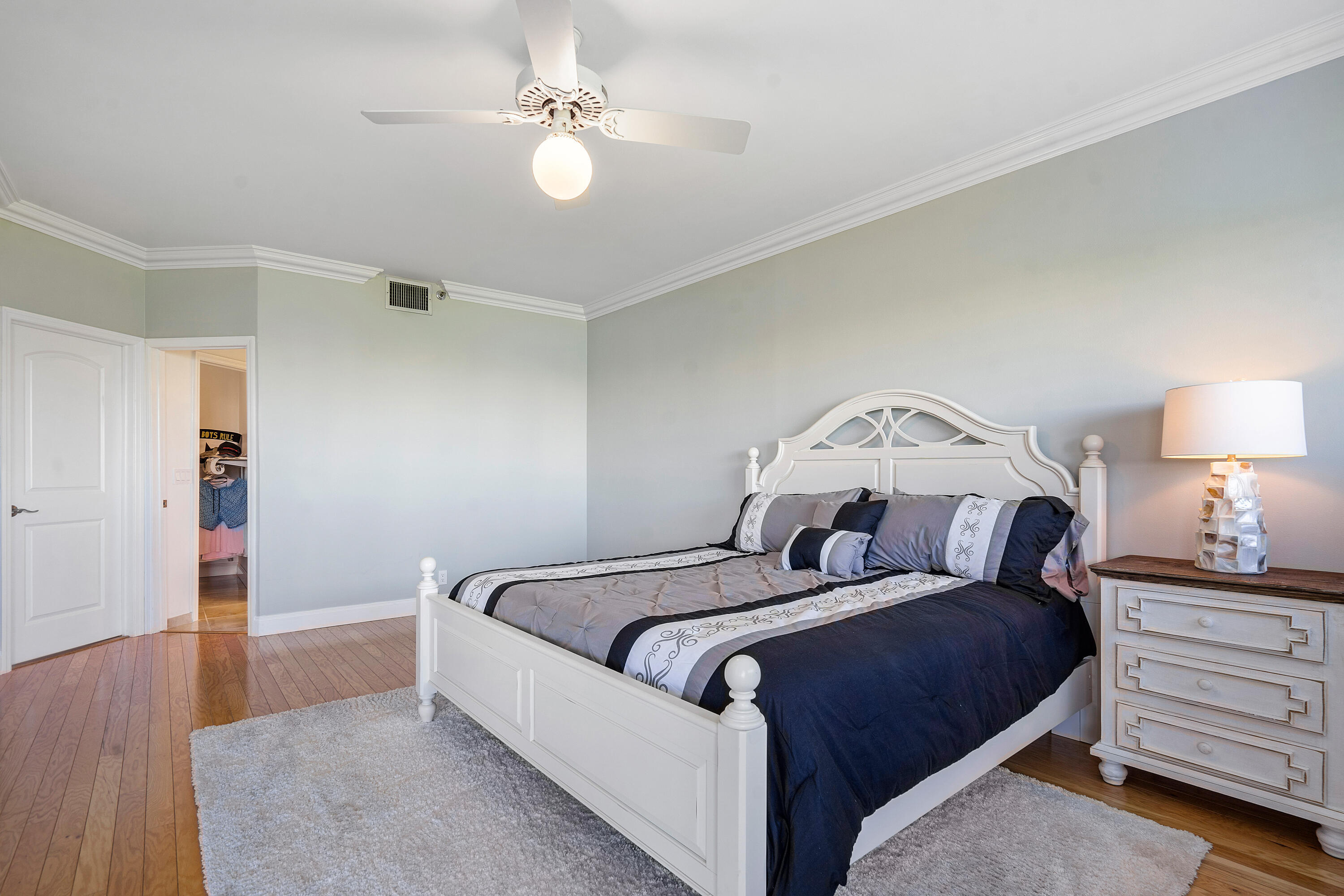200 Waterway Road, Unit 204 Tequesta, FL 33469 - Photo 17 of 34 Primary bedroom to bathroom