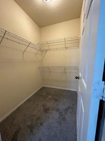 a view of a room with racks on the wall
