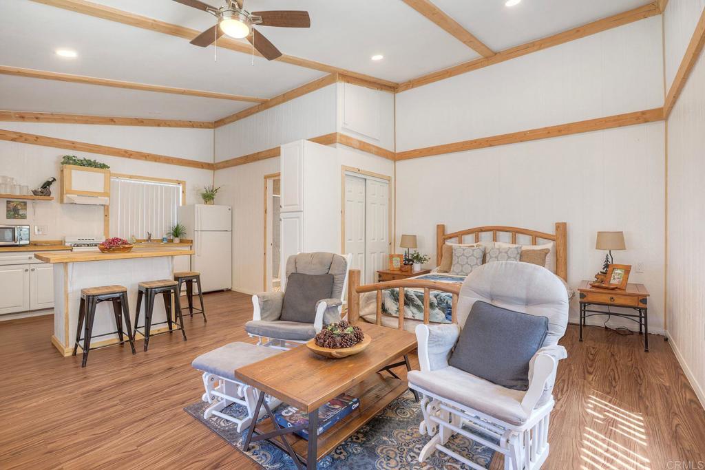 22223 Crestline Road Palomar Mountain, CA 92060 - Photo 33 of 90 a living room with furniture and a wooden floor