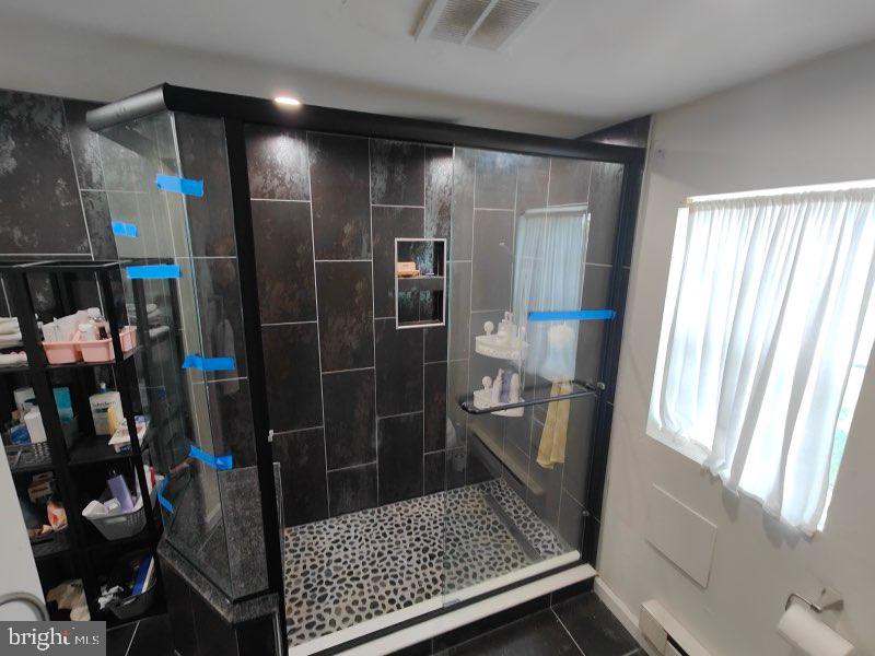 1929 North 9th Street Philadelphia, PA 19122 - Photo 13 of 49 a bathroom with a shower