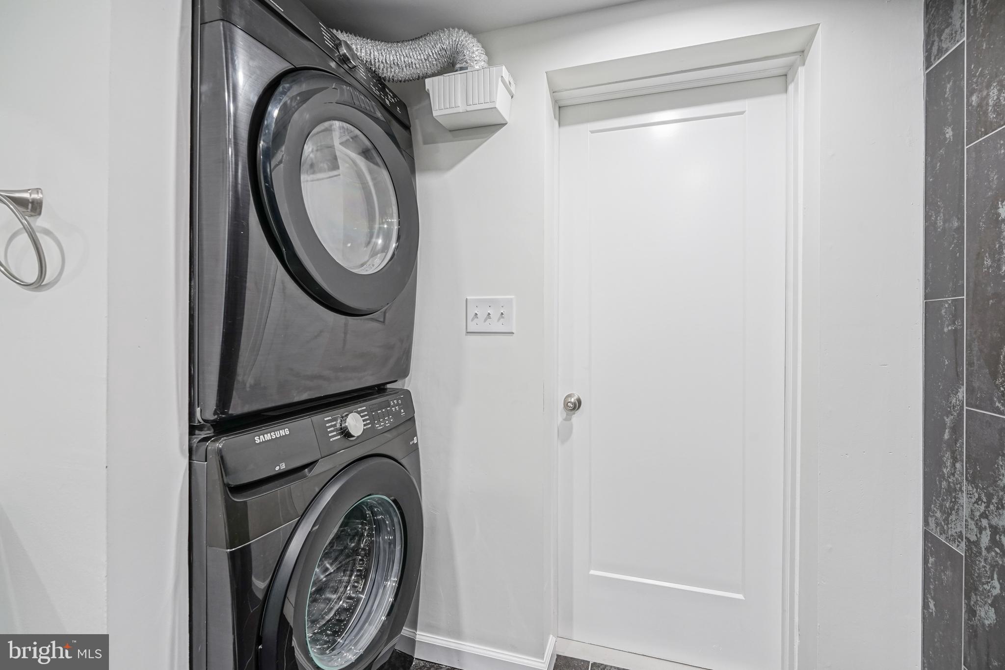 1929 North 9th Street Philadelphia, PA 19122 - Photo 16 of 49 a utility room with dryer and washer