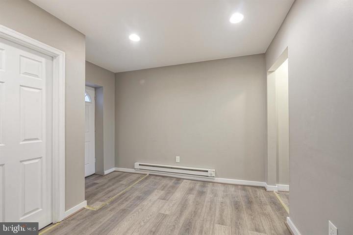 1929 North 9th Street Philadelphia, PA 19122 - Photo 26 of 49 an empty room with wooden floor