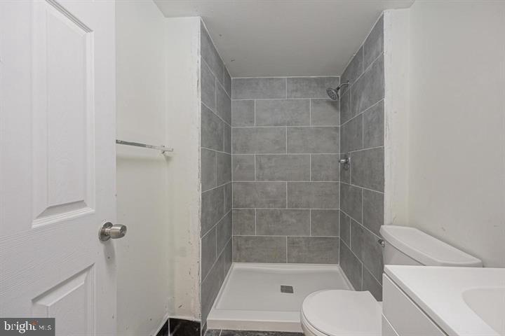 1929 North 9th Street Philadelphia, PA 19122 - Photo 33 of 49 a bathroom with a shower and a toilet