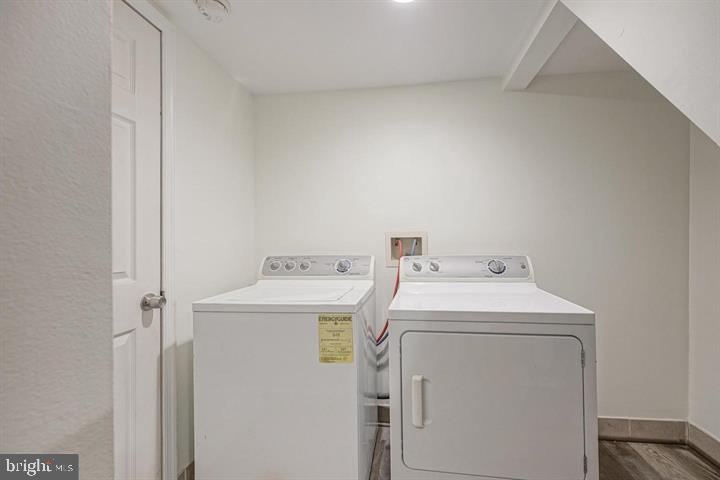 1929 North 9th Street Philadelphia, PA 19122 - Photo 38 of 49 a utility room with dryer and washer