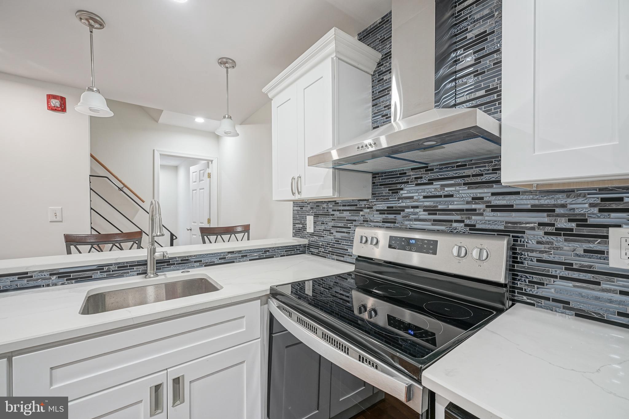1929 North 9th Street Philadelphia, PA 19122 - Photo 4 of 49 a kitchen with a stove and a sink