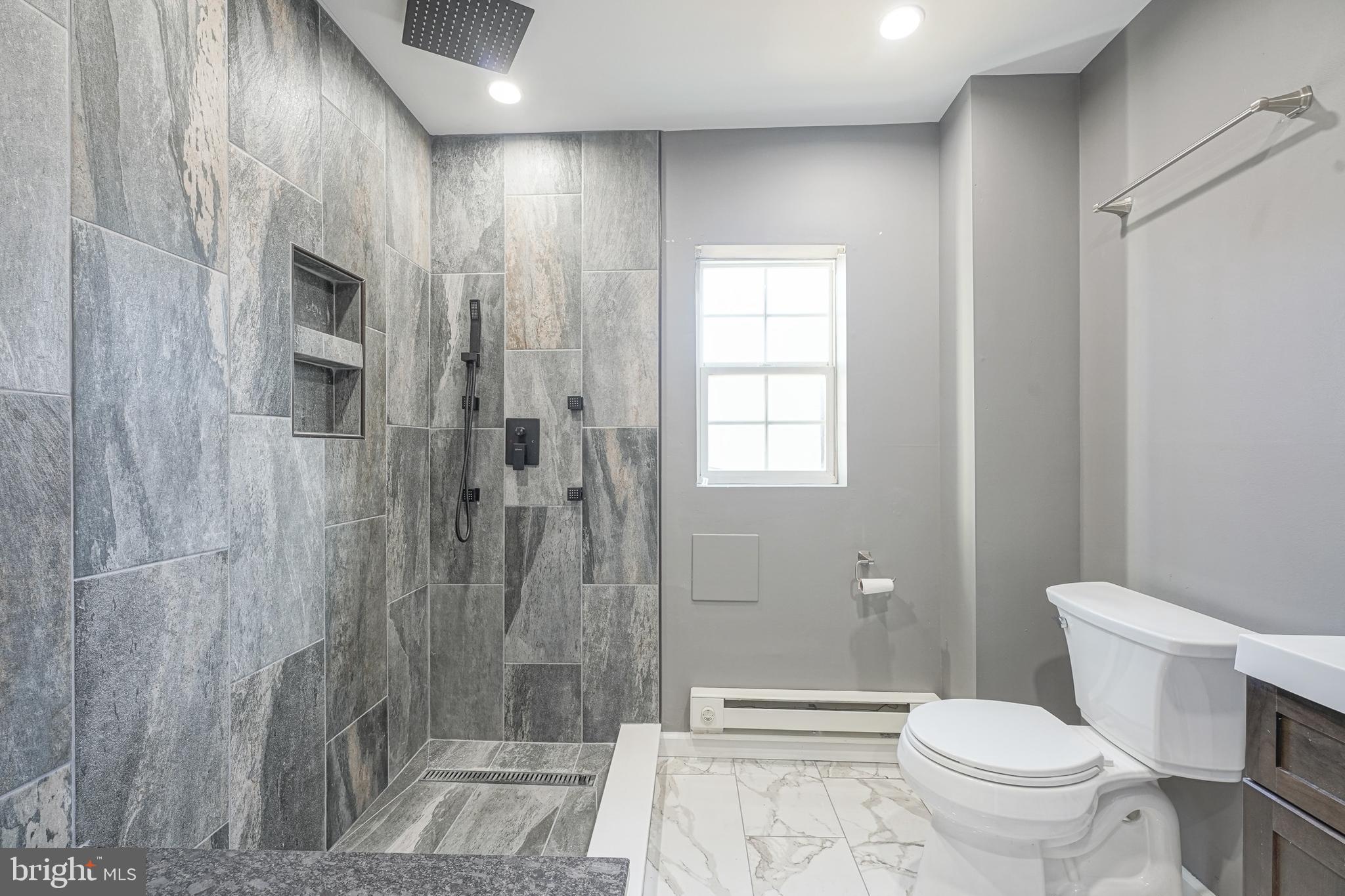 1929 North 9th Street Philadelphia, PA 19122 - Photo 5 of 49 a bathroom with a toilet and a shower
