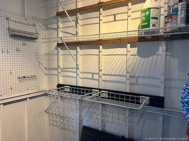 a bathroom with a sink and a window