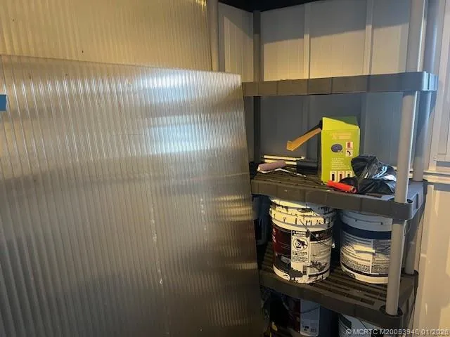 a bathroom with a sink a vanity and a mirror