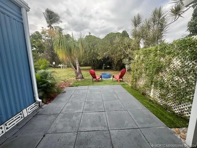 a garden view with a seating space