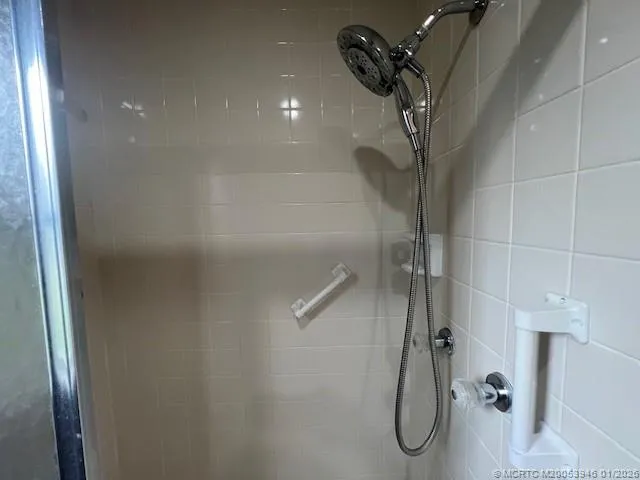 a view of light fixtures and wooden floor