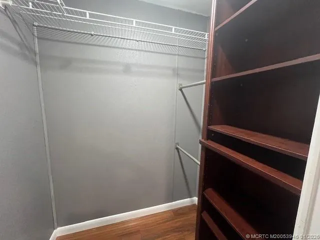 a view of a car in front of a building