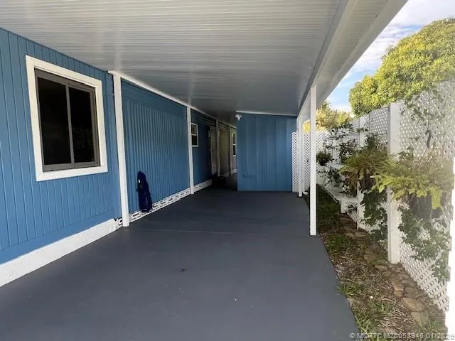 a view of a back yard of the house