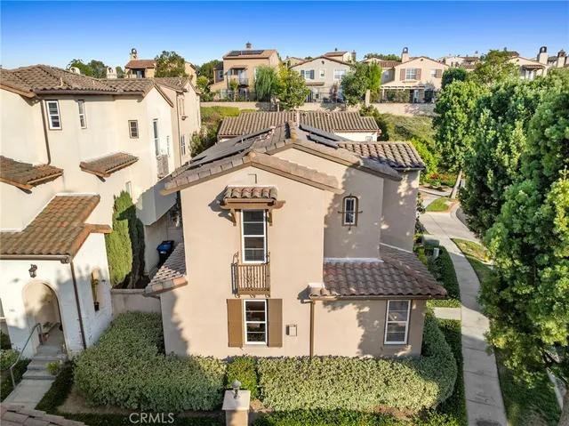 a front view of a house with swimming pool