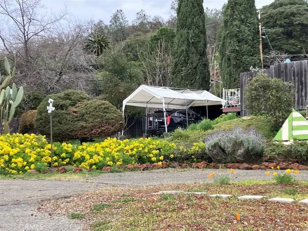 a terrace with outdoor seating and city view