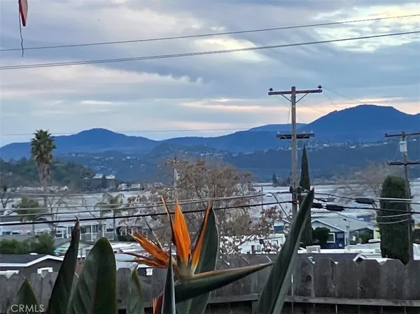 a view of a swimming pool and a yard