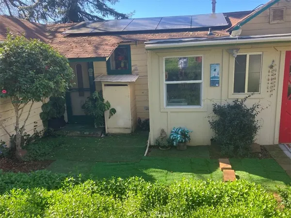 a backyard of a house with lots of green space