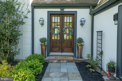 a front view of a house with a porch