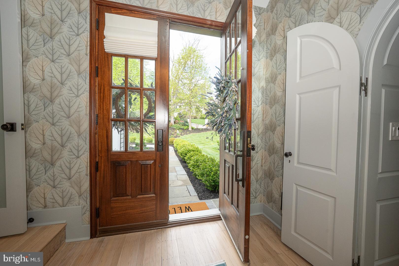 945 Lafayette Road Bryn Mawr, PA 19010 - Photo 3 of 53 a view of entryway with wooden floor and garden view