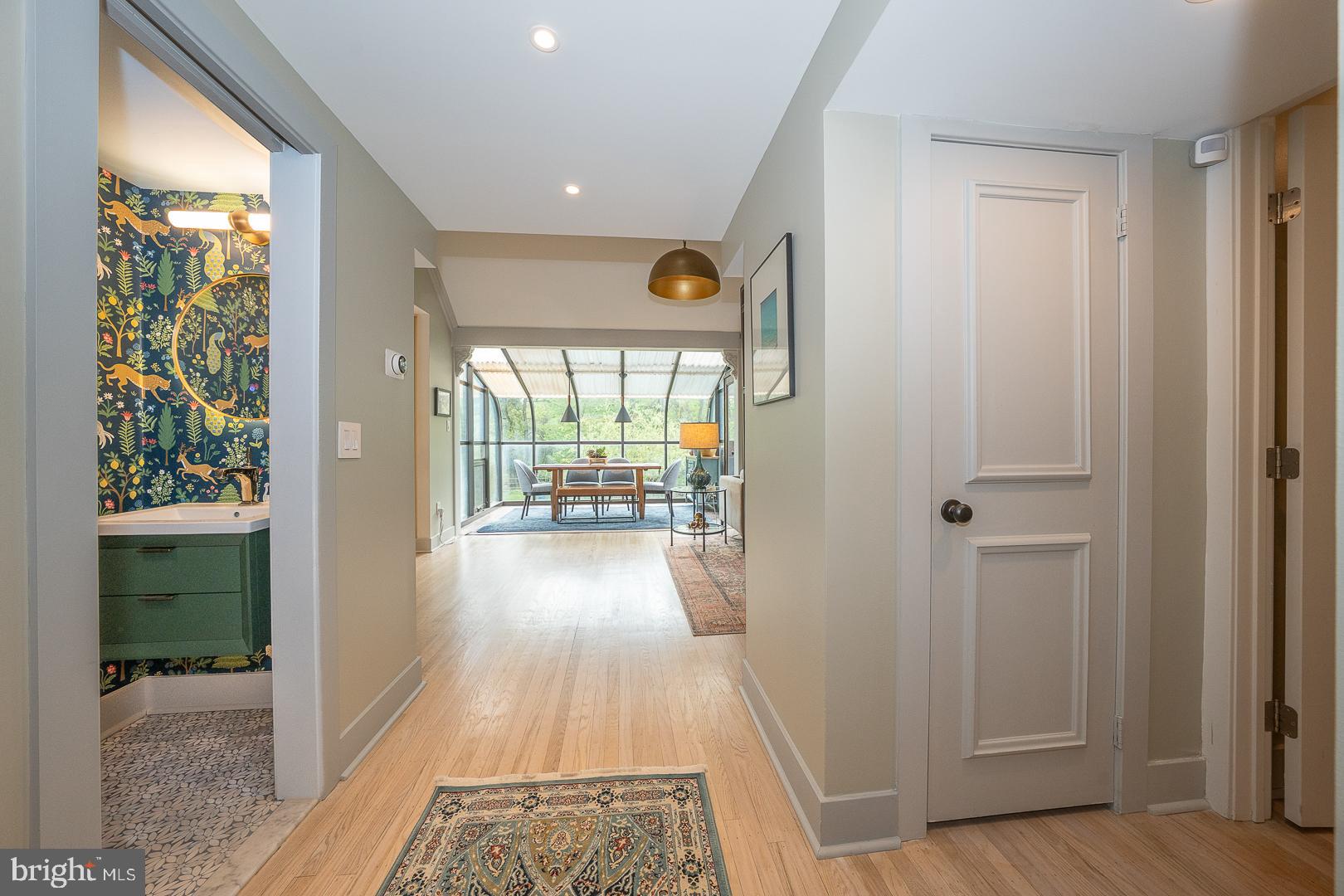 945 Lafayette Road Bryn Mawr, PA 19010 - Photo 5 of 53 a view of hallway with wooden floor and a window