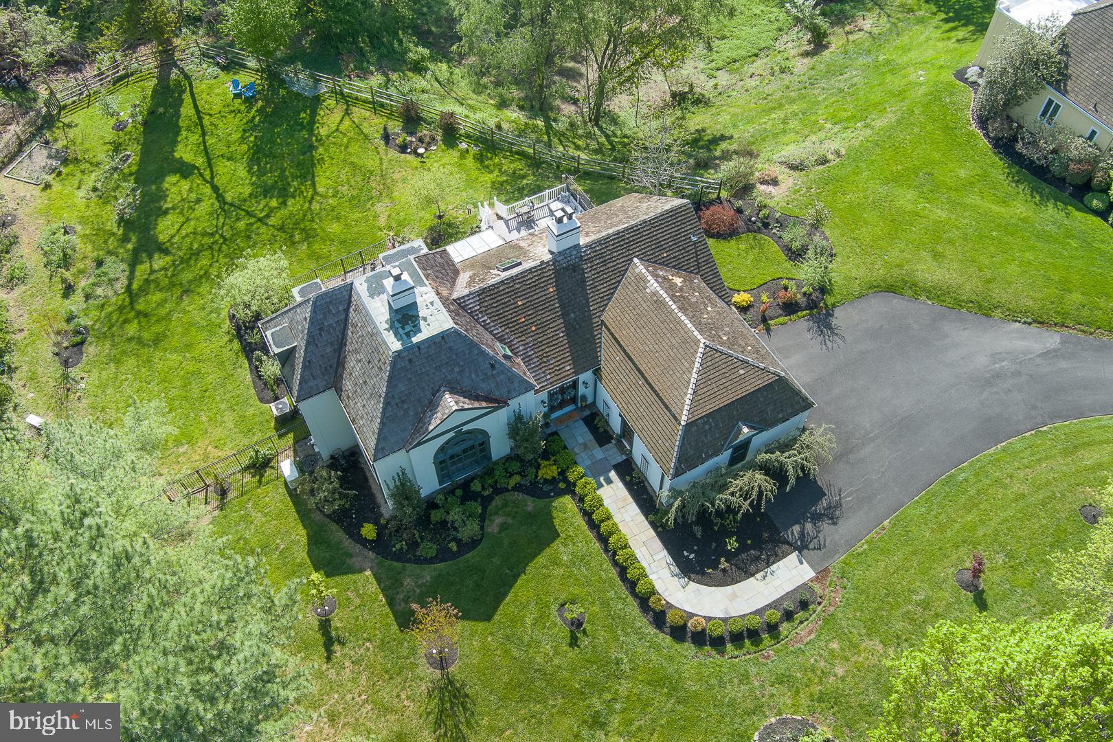 945 Lafayette Road Bryn Mawr, PA 19010 - Photo 52 of 53 an aerial view of a house with swimming pool and garden