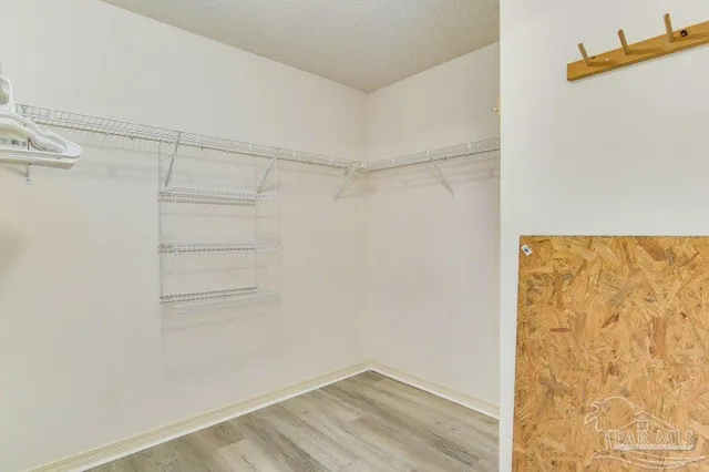 a view of an empty walk in closet