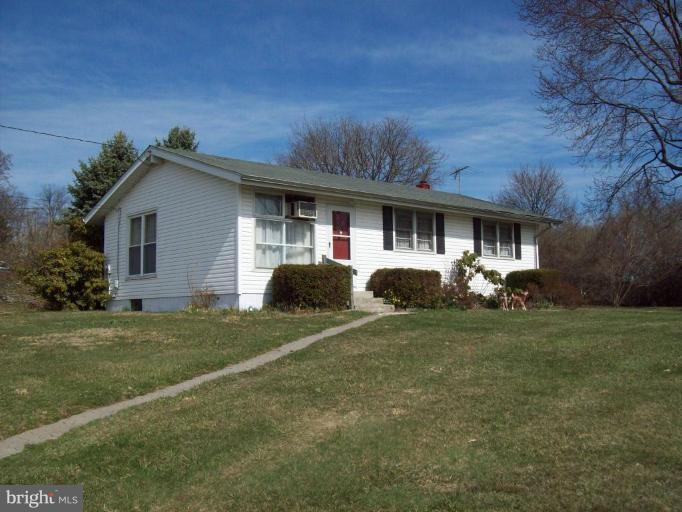 3538 Basler Road Hampstead, MD 21074 - Photo 2 of 14 a front view of house with yard and green space