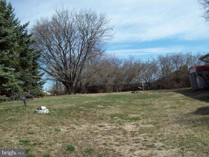3538 Basler Road Hampstead, MD 21074 - Photo 5 of 14 a view of a field with trees
