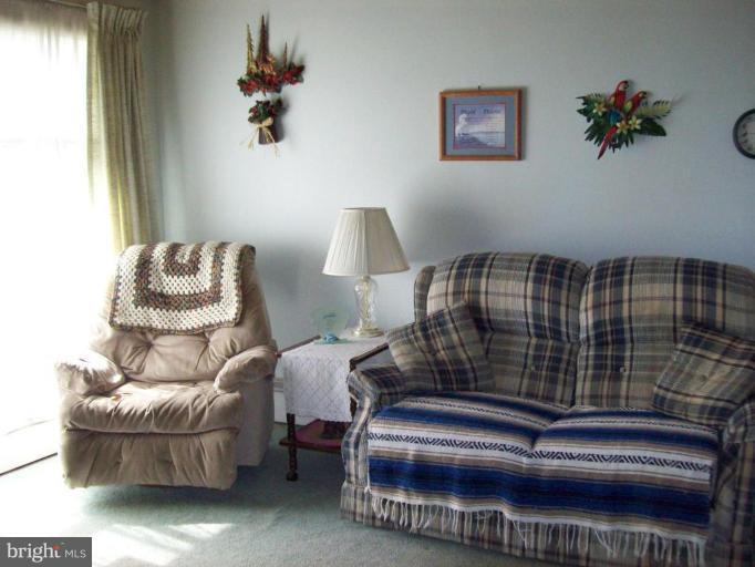 3538 Basler Road Hampstead, MD 21074 - Photo 6 of 14 a bedroom with furniture and a window