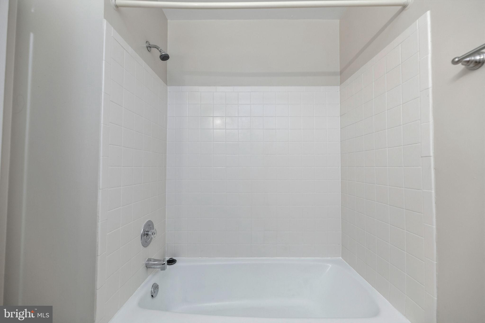 1443 Northgate Square, Unit 22B Reston, VA 20190 - Photo 15 of 42 a close up of a bathtub
