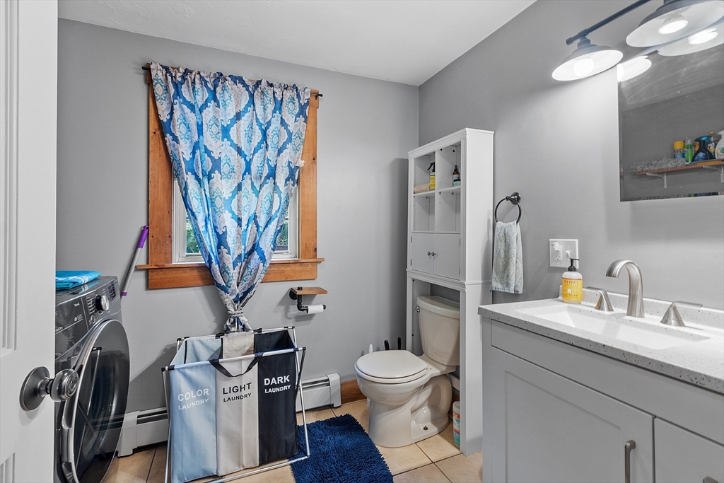 76 Ferin Road Ashburnham, MA 01430 - Photo 14 of 41 a bathroom with a toilet sink and mirror