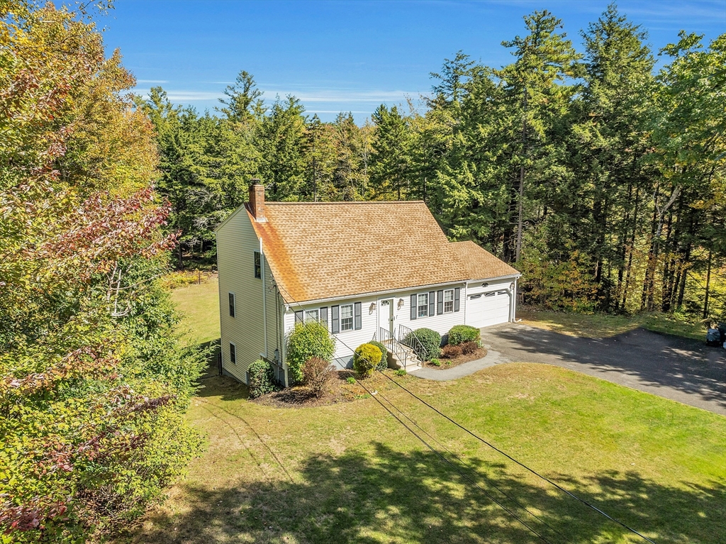 76 Ferin Road Ashburnham, MA 01430 - Photo 2 of 41 a view of a house with a yard and garage