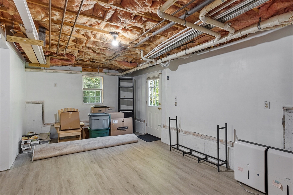 76 Ferin Road Ashburnham, MA 01430 - Photo 21 of 41 a bedroom with furniture and wooden floor