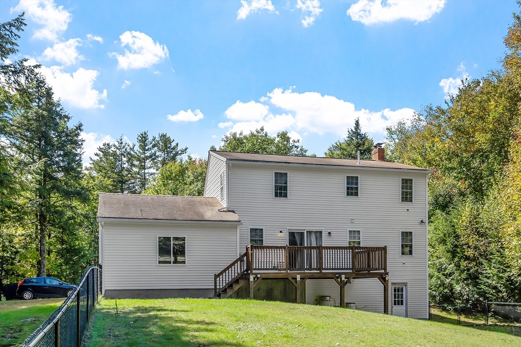 76 Ferin Road Ashburnham, MA 01430 - Photo 25 of 41 a view of a backyard with a garden