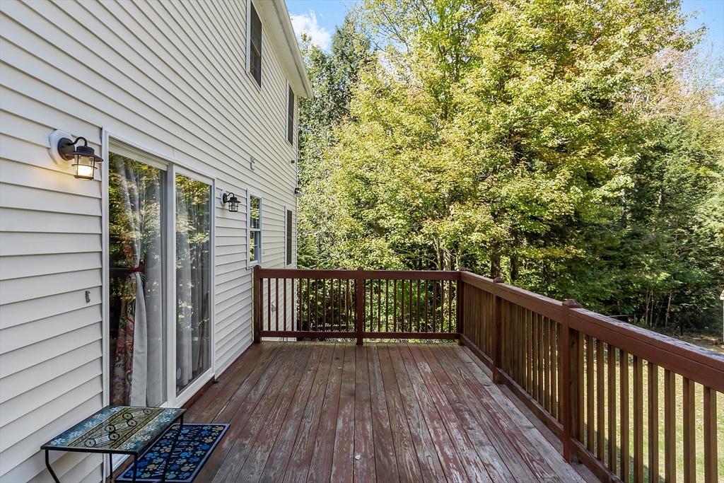 76 Ferin Road Ashburnham, MA 01430 - Photo 26 of 41 a view of balcony with wooden floor