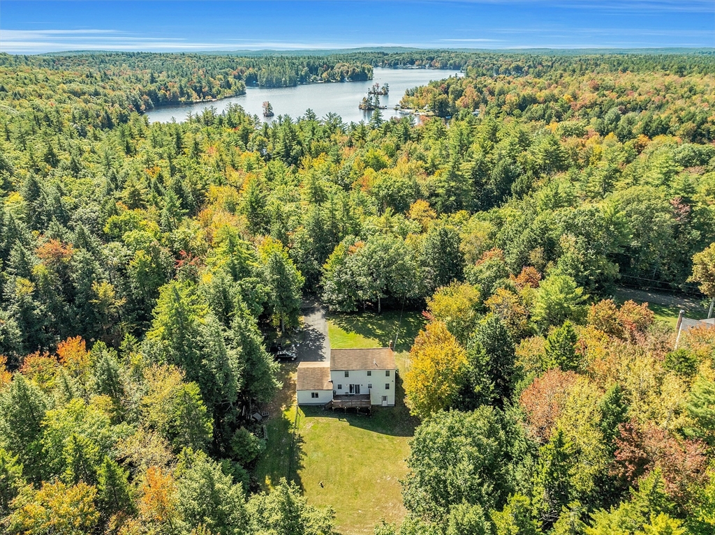 76 Ferin Road Ashburnham, MA 01430 - Photo 3 of 41 a view of a city with lush green forest