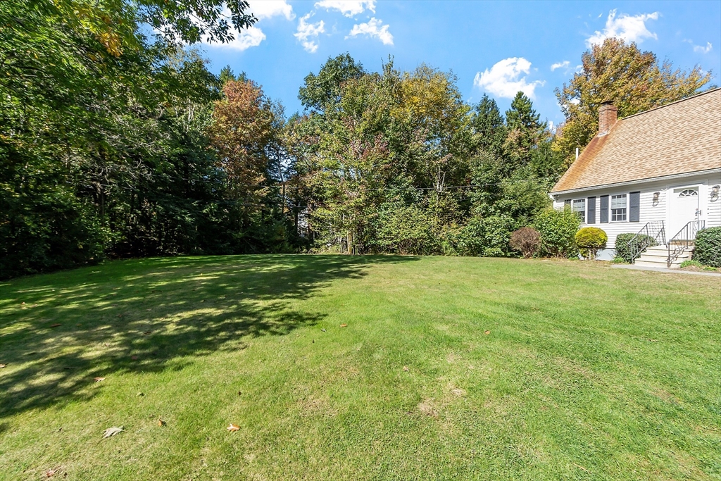 76 Ferin Road Ashburnham, MA 01430 - Photo 39 of 41 a view of a garden with a house