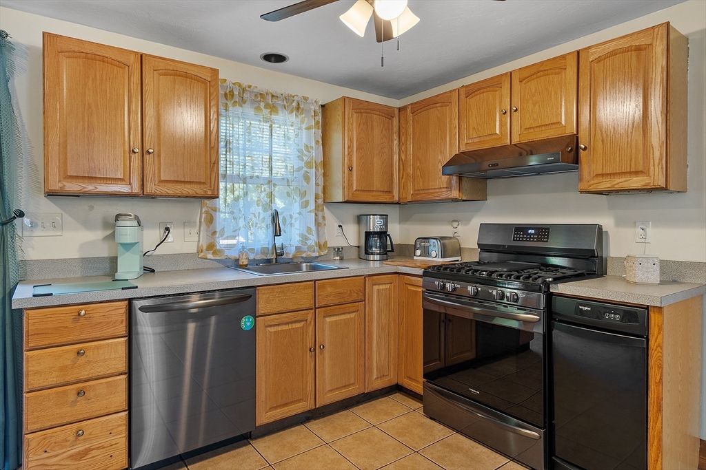 76 Ferin Road Ashburnham, MA 01430 - Photo 9 of 41 a kitchen with stainless steel appliances granite countertop a stove sink and cabinets