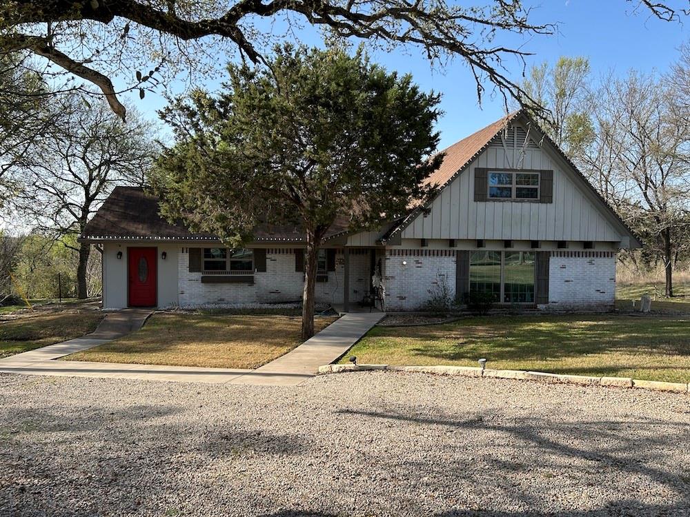 649 Wedgewood Drive China Spring, TX 76633 - Photo 1 of 39 View of front of property featuring brick siding and a front yard