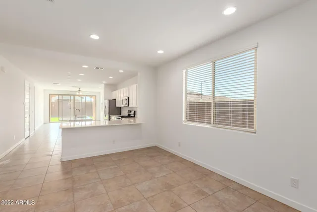 an empty room with natural light