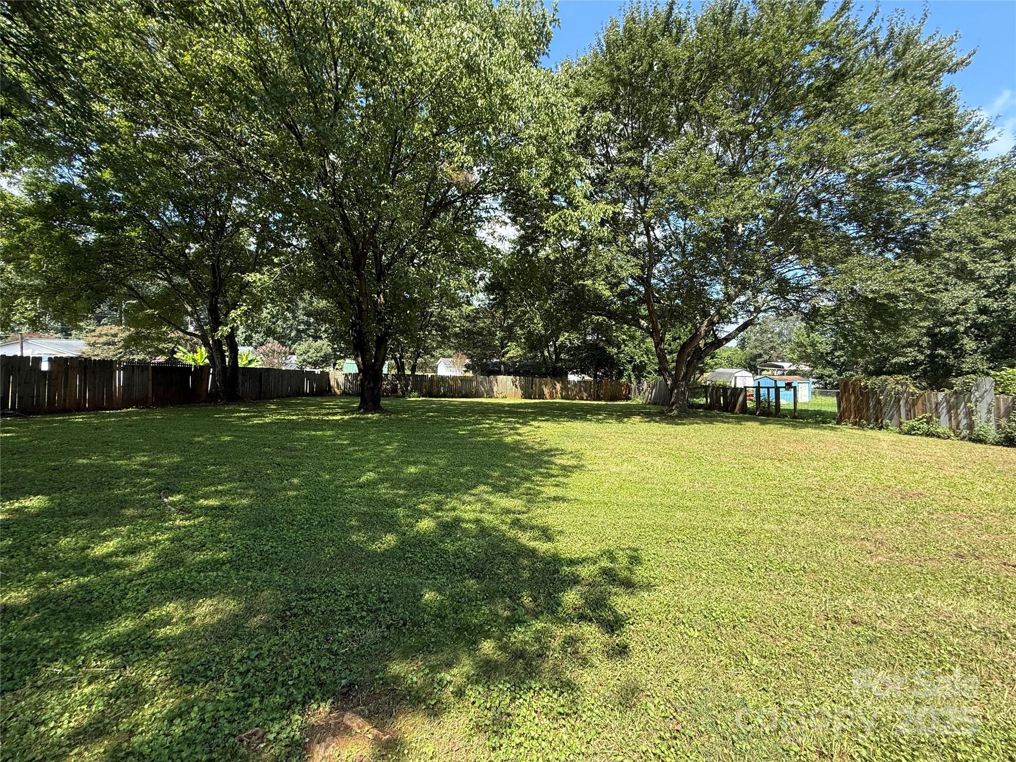4793 Panama Drive Conover, NC 28613 - Photo 16 of 21 a view of yard with swimming pool and green space