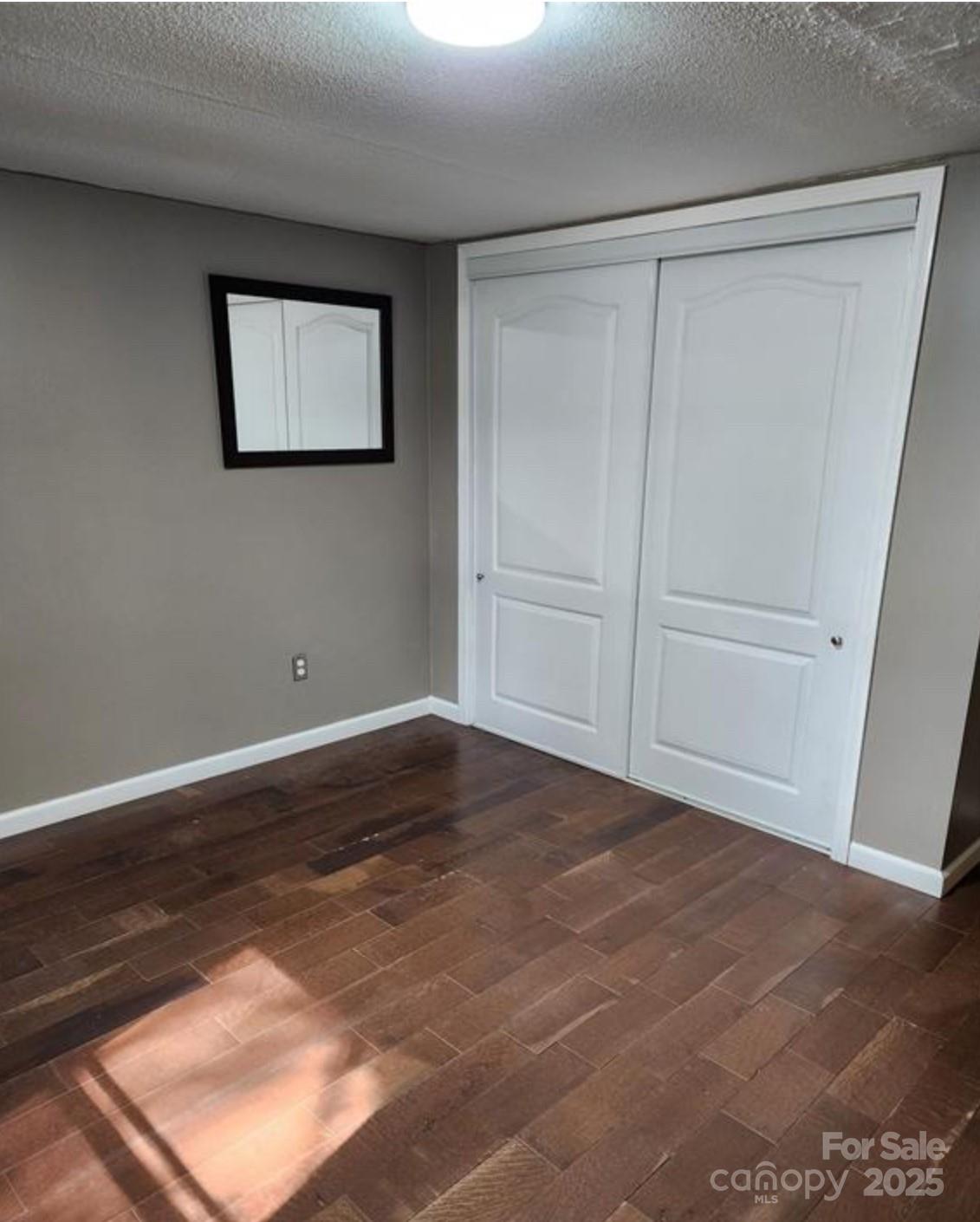 4793 Panama Drive Conover, NC 28613 - Photo 9 of 21 a view of empty room with wooden floor